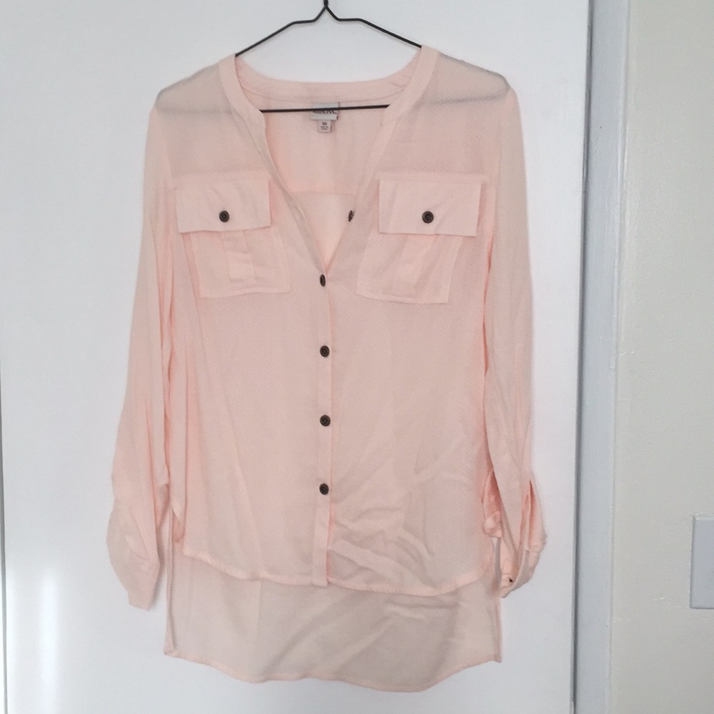 Elegant pink blouse with subtle texture